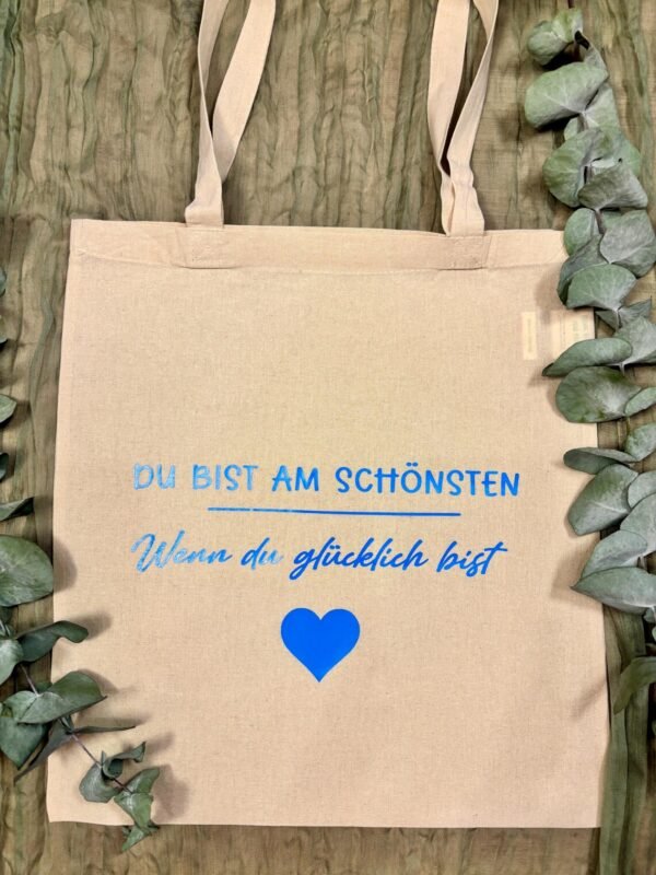 Stofftasche mit Spruch – Druckfarbe wählbar – Jutebeutel Du bist am schönsten wenn du glücklich bist – Geschenkidee Baumwolltasche