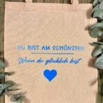 Stofftasche mit Spruch – Druckfarbe wählbar – Jutebeutel Du bist am schönsten wenn du glücklich bist – Geschenkidee Baumwolltasche